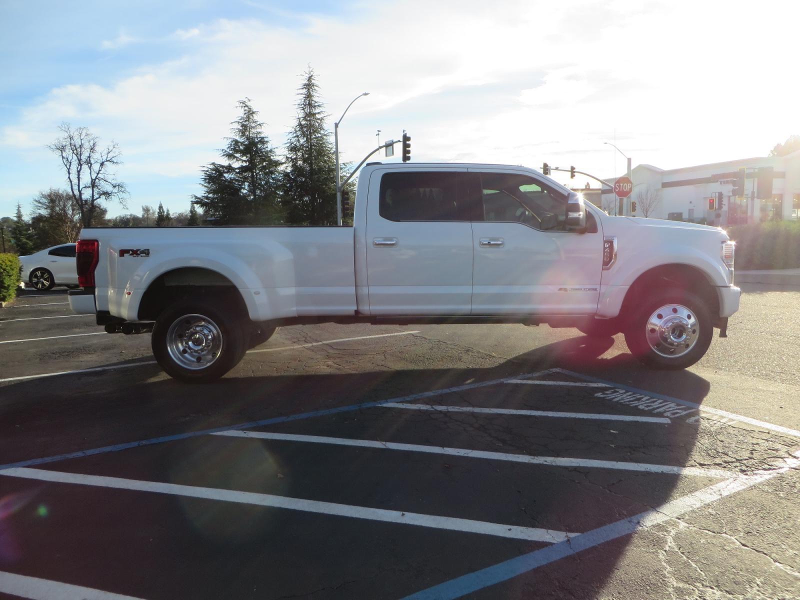 2020 White /BLACK Ford F-450 SD PlatinumCrew Cab DRW 4WD (1FT8W4DT4LE) with an 6.7L V8 OHV 16V DIESEL engine, 6A transmission, located at 2630 Grass Valley Highway, Auburn, CA, 95603, (530) 508-5100, 38.937893, -121.095482 - Must see F450 with a tool box refueling station, window tint, and a center console vault. - Photo #3
